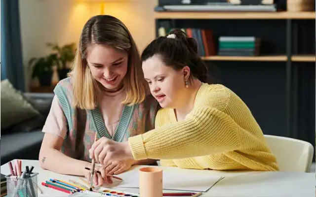 Support worker with intellectual disability service users